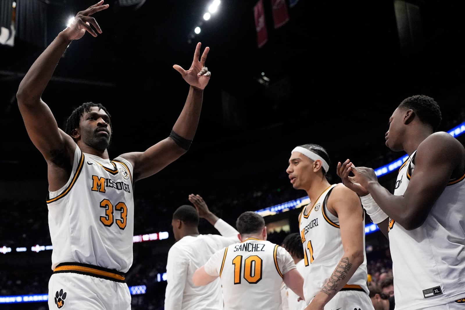 Missouri center Josh Gray (33) celebrates victory over Mississippi State after the second half of an NCAA college basketball game in the second round of the Southeastern Conference tournament, Thursday, March 13, 2025, in Nashville, Tenn. (AP Photo/George Walker IV)