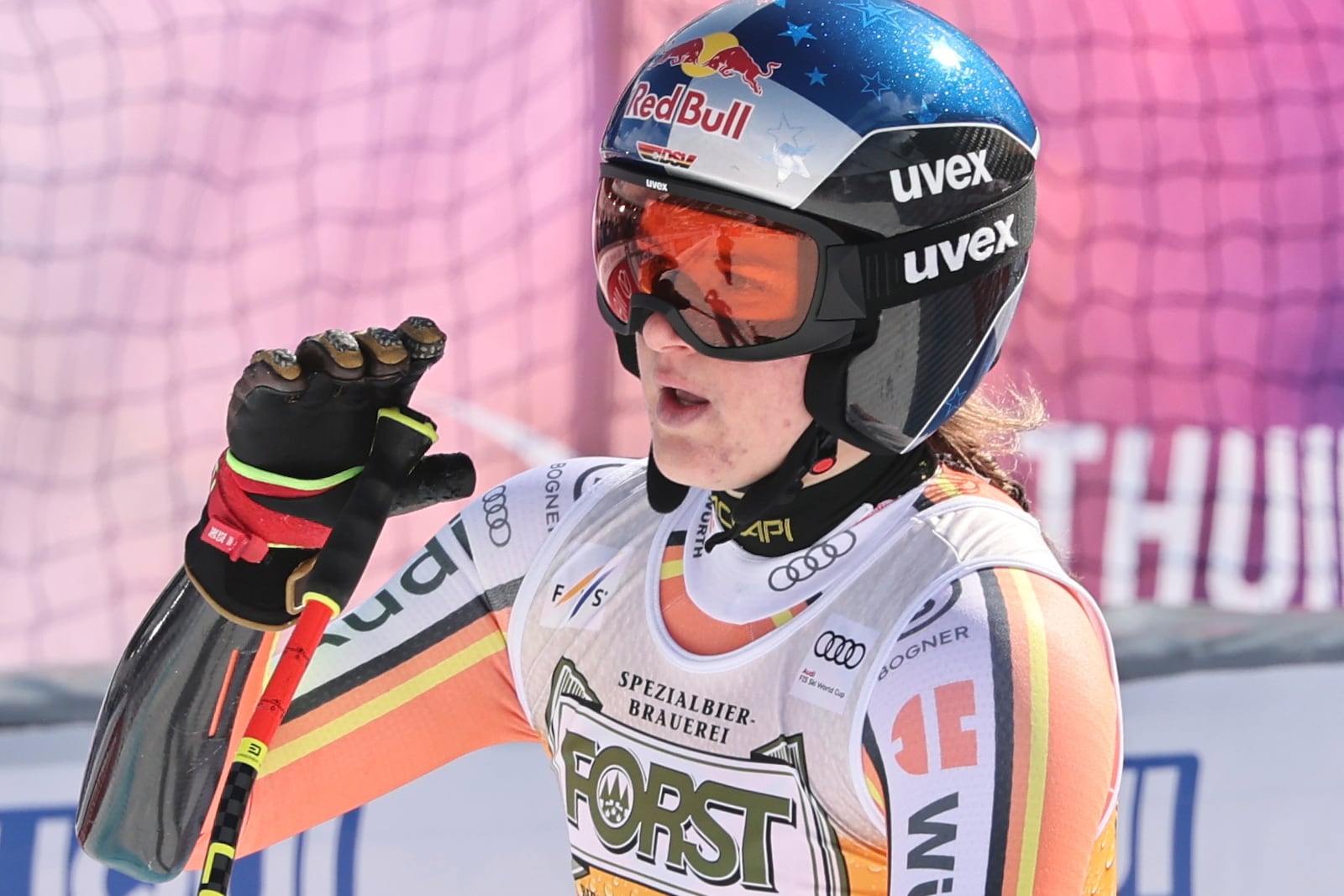 Germany's Emma Aicher reacts after completing an alpine ski, women's World Cup super G race, in La Thuile, Italy, Thursday, March 13, 2025. (AP Photo/Marco Trovati)