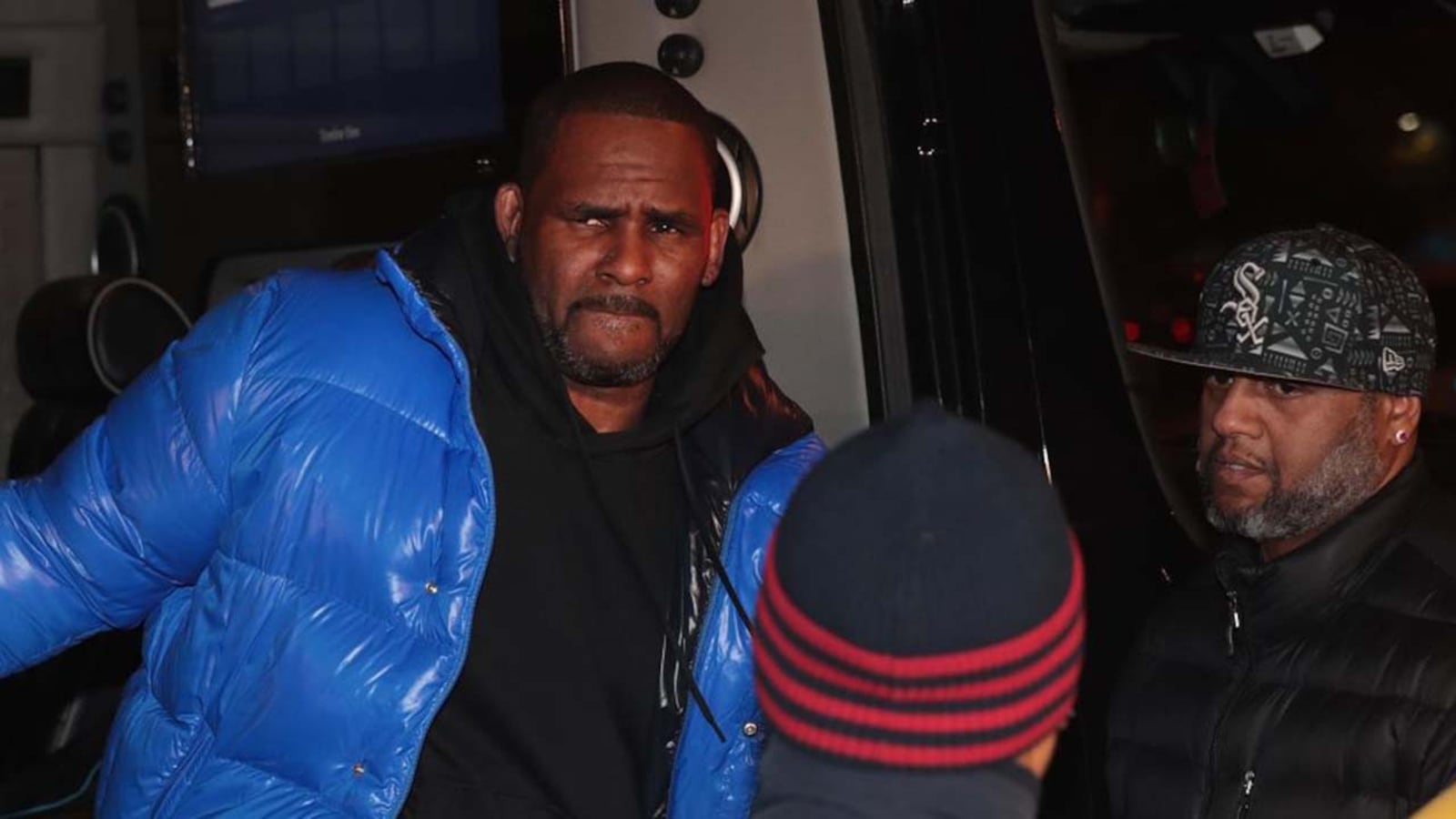 R&B singer R. Kelly arrives at the 1st District-Central police station on February 22, 2019 in Chicago, Illinois. Cook County State's Attorney Kim Foxx announced that Kelly has been charged with 10 counts of aggravated sexual abuse of four victims, at least three between the ages of 13 and 17.