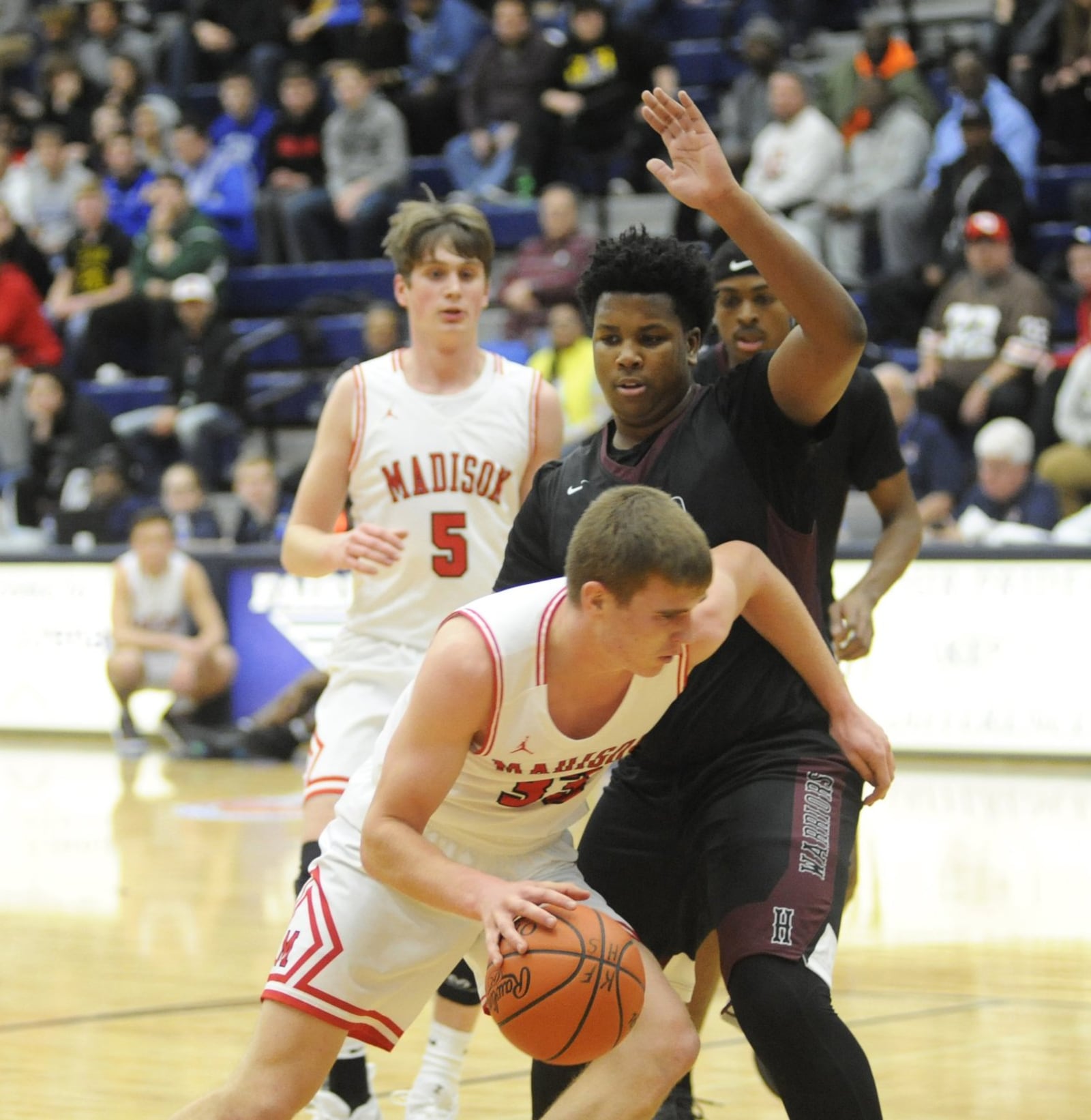 Madison's Levi McMonigle tries to dribble around Elijah Glenn of Canal Winchester Harvest Prep during Monday night's Premier Health Flyin' to the Hoop at Fairmont's Trent Arena. Harvest Prep won 79-56. MARC PENDLETON/STAFF