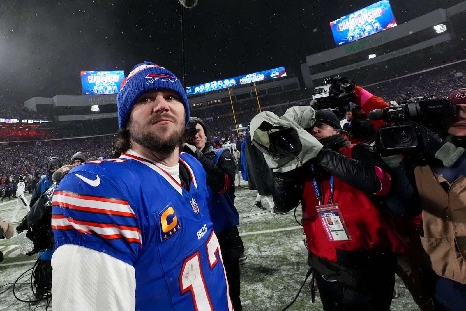 Buffalo Bills quarterback Josh Allen (17) walks off the field after playing against the Baltimore Ravens in an NFL divisional playoff football game, Sunday, Jan. 19, 2025, in Orchard Park, N.Y. (AP Photo/Gene J. Puskar)