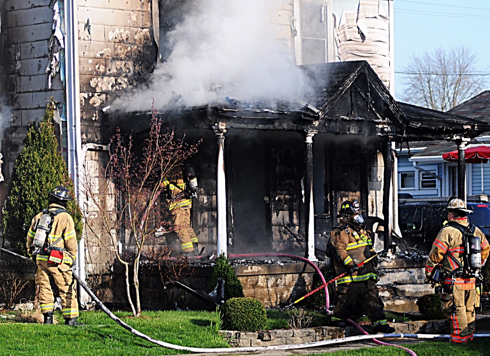 Fire erupts at Tipp City house - Marshall Gorby/STAFF