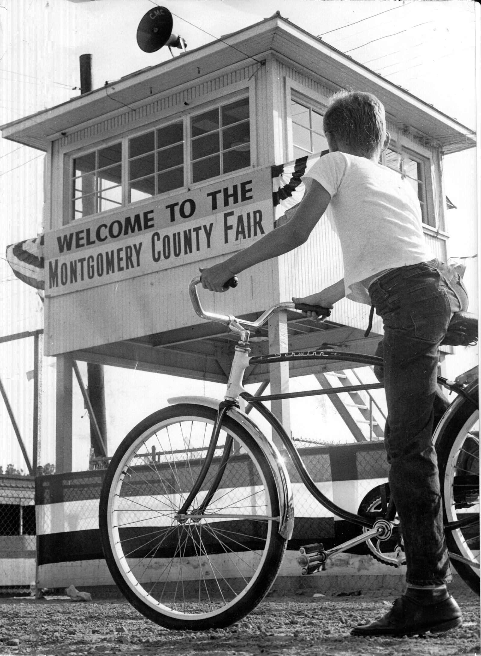 Twelve-year-old Ralph Yordy awaits the official opening of the 1962 Montgomery County Fair. DAYTON DAILY NEWS ARCHIVE