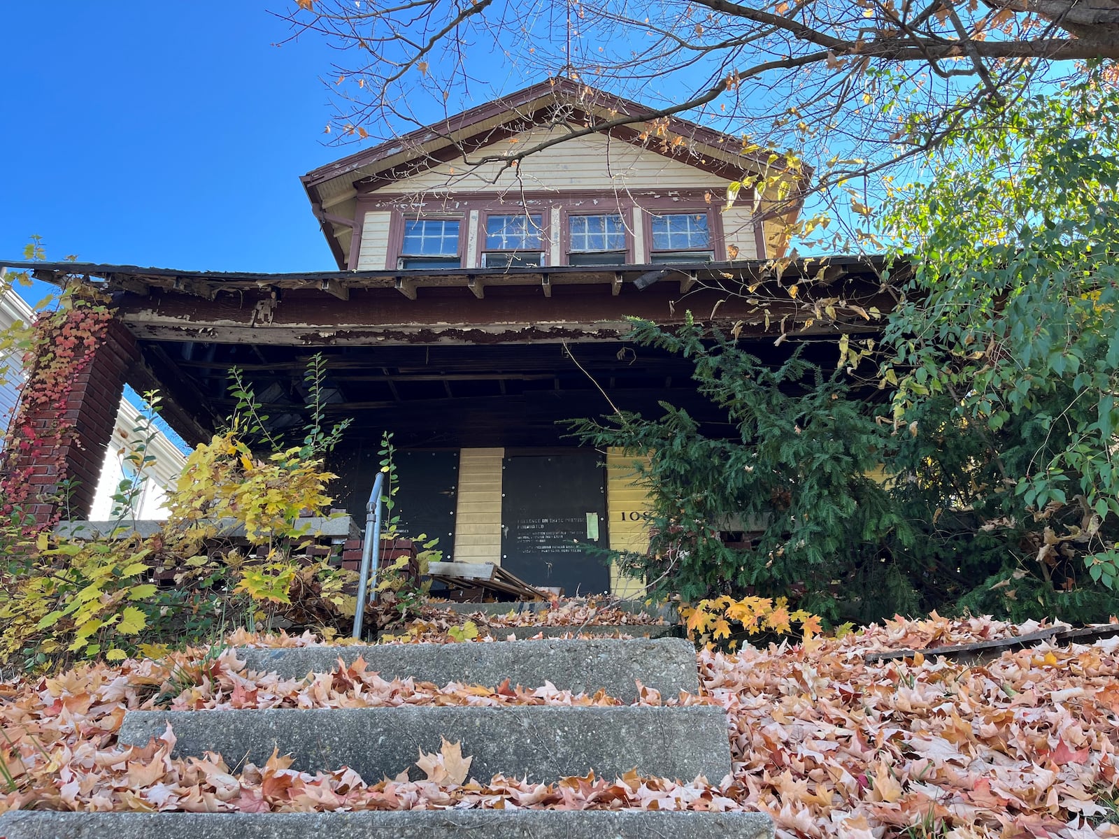 Dayton housing inspectors recently issued a minor misdemeanor criminal citation to the owner of this home in northwest Dayton for failing to maintain the exterior of the property. CORNELIUS FROLIK / STAFF