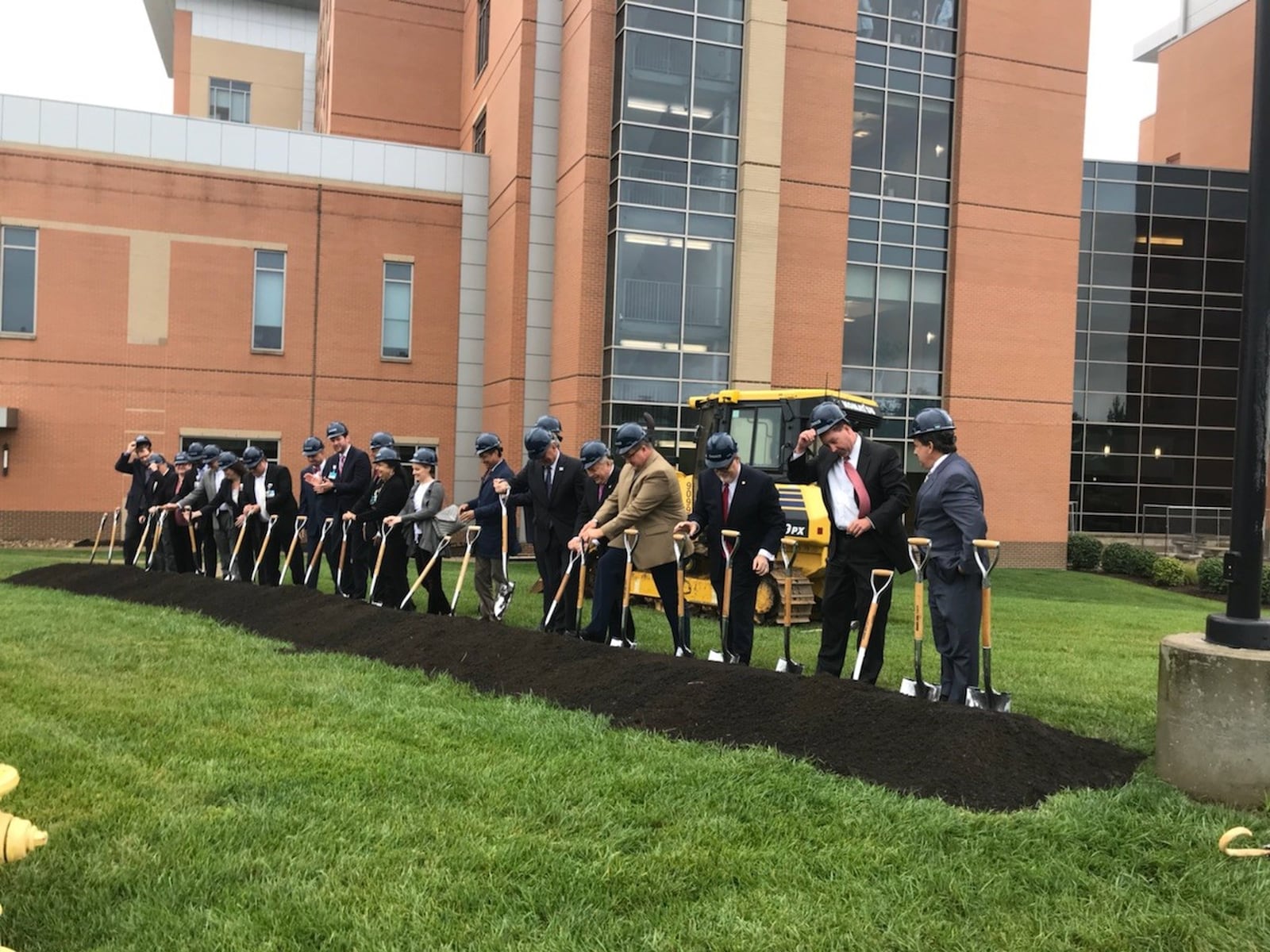 Kettering Health officials break ground on a new 170,000 square-foot tower at Soin Medical Center. KAITLIN SCHROEDER/STAFF