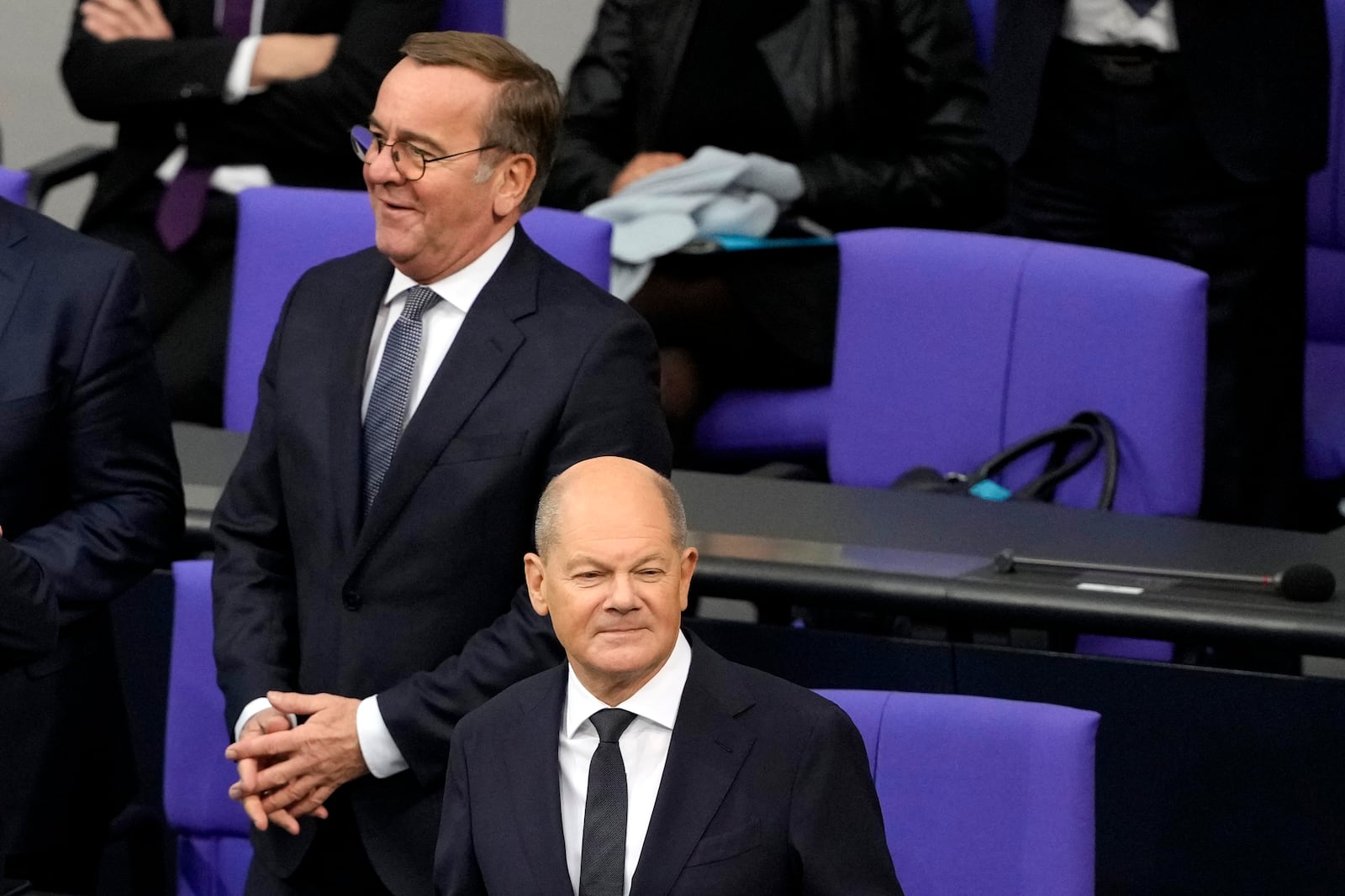 German Chancellor Olaf Scholz, right, and defence minister Boris Pistorius attend a plenary session in the German parliament Bundestag in Berlin, Germany, Wednesday, Nov. 13, 2024. (AP Photo/Markus Schreiber)