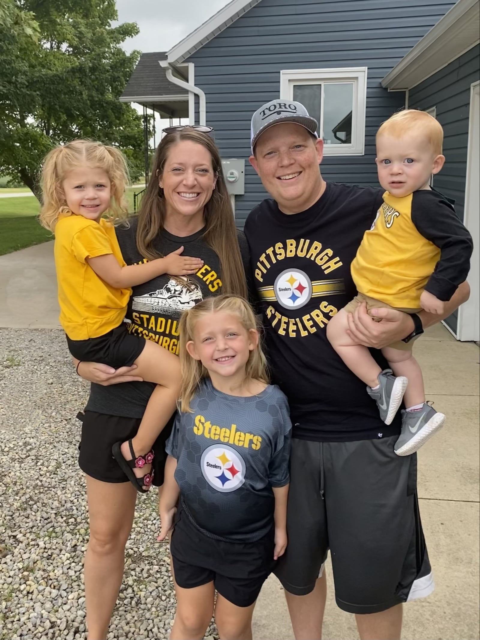 The Roche Family’s Steel Curtain: Parker in front, flanked left to right by sister Quinn, mom Megan, dad Ryan and brother Caden. CONTRIBUTED