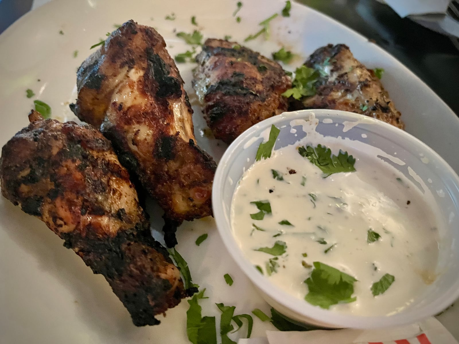 Char-Grilled Hot Wings from Pies & Pints at The Greene in Beavercreek. NATALIE JONES/STAFF