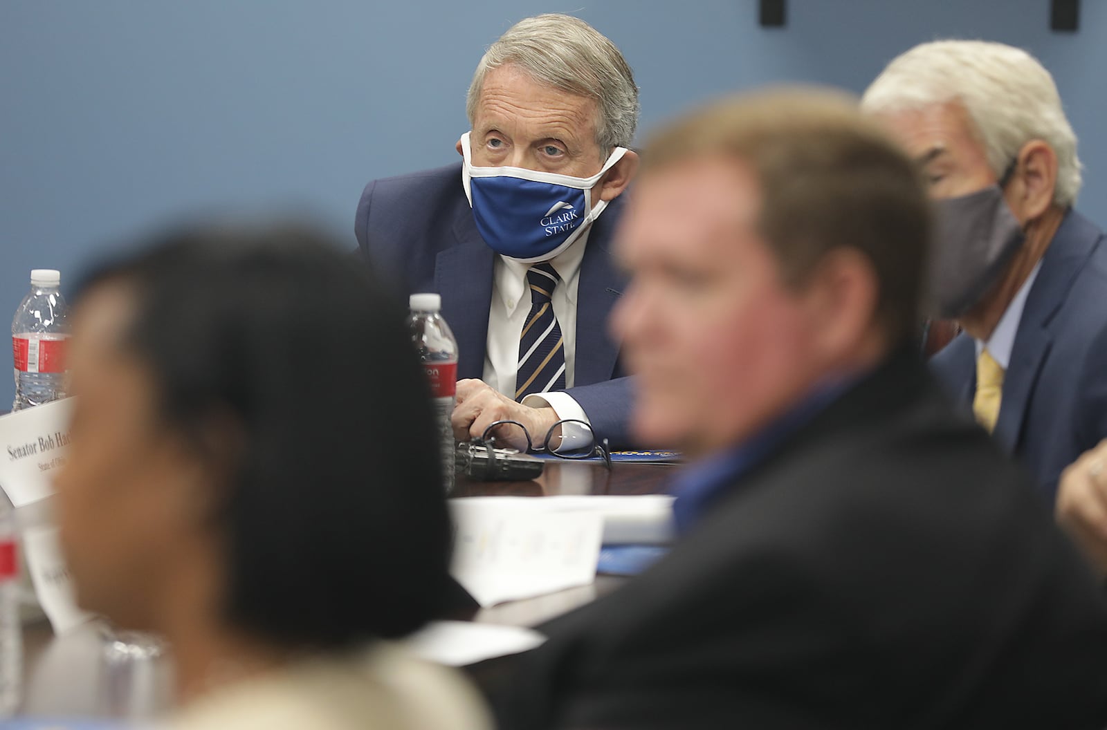 Governor Mike DeWine meets with Clark State College officials as well as students and members of the manufacturing community following a tour of the College's Advanced Manufacturing Lab Monday. BILL LACKEY/STAFF