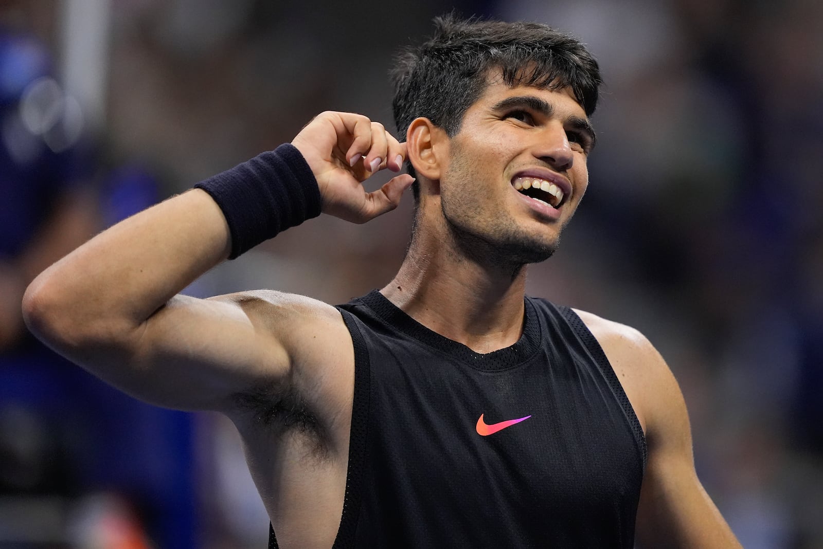 FILE - Carlos Alcaraz, of Spain, reacts during a match against Li Tu, of Australia, during the first round of the U.S. Open tennis championships, Tuesday, Aug. 27, 2024, in New York. (AP Photo/Matt Rourke, File)