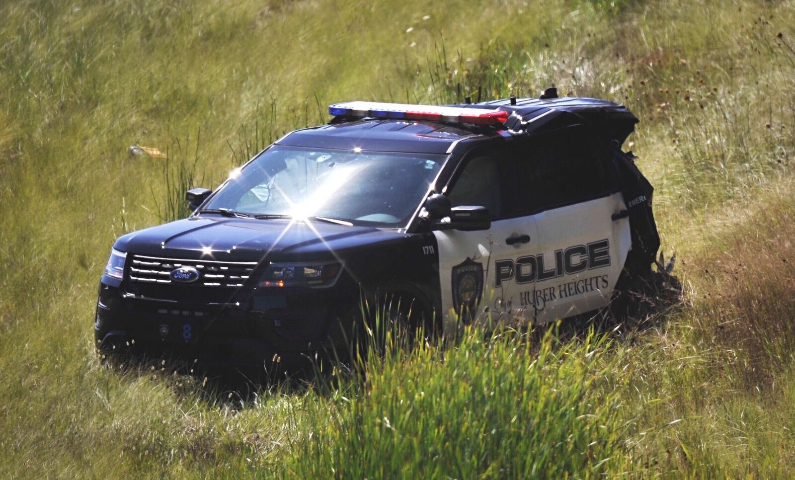 A motorist in a pursuit with the Ohio State Highway Patrol on Interstate 70 West slammed into the back of a Huber Heights Police Division cruiser Thursday, Aug. 20, 2020, near the Bridgewater Road overpass.