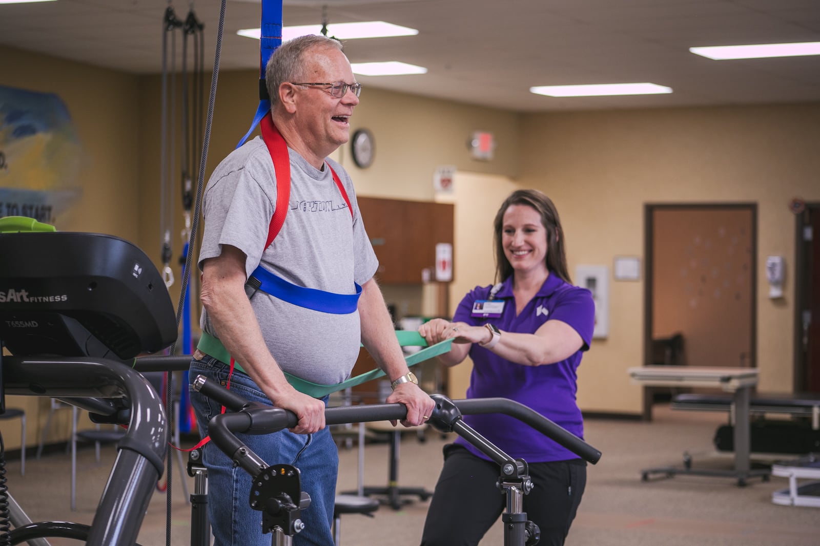 A physical therapist helps a patient at the Kettering Health NeuroRehab and Balance Center, located at 7677 Yankee St. in Centerville. The center is starting a residency program for neurologic physical therapy. Neurologic physical therapy helps patients with neurologic and vestibular disorders improve muscle control, strength, walking, coordination, dizziness, functional mobility and balance. COURTESY OF KETTERING HEALTH