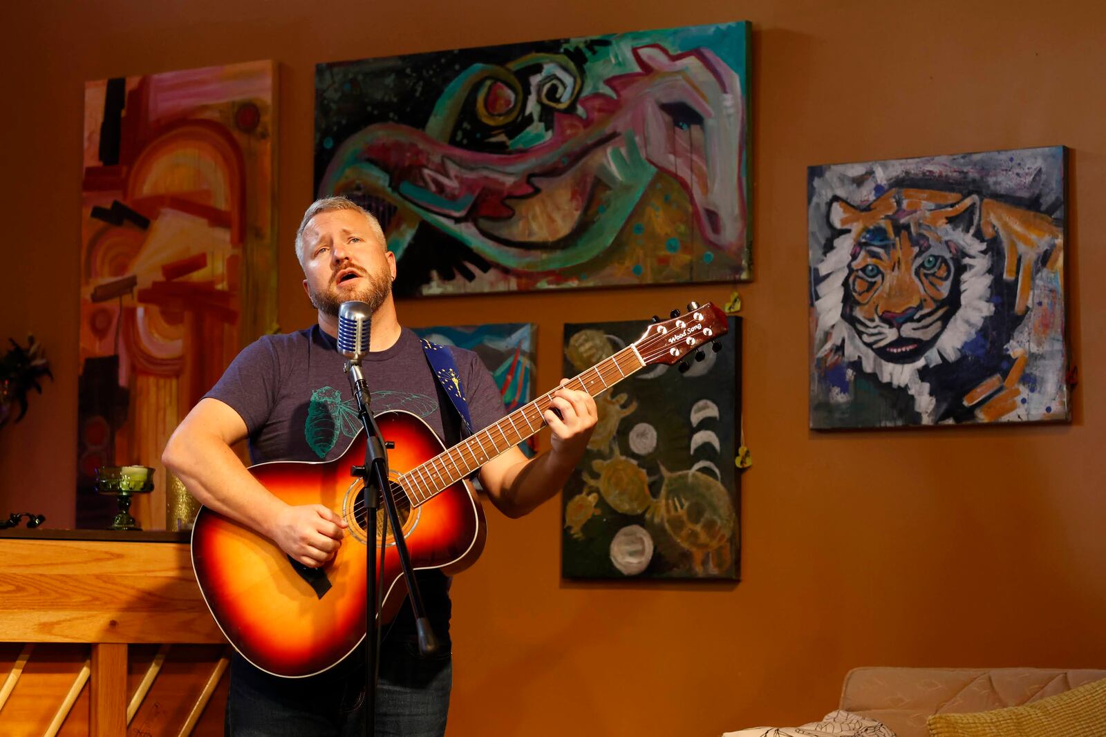 Achilles Tenderloin, the musical project of Richmond, Indiana folk blues musician Joe Augustin, performs at the Hidden Gem Music Club in Centerville on Saturday.