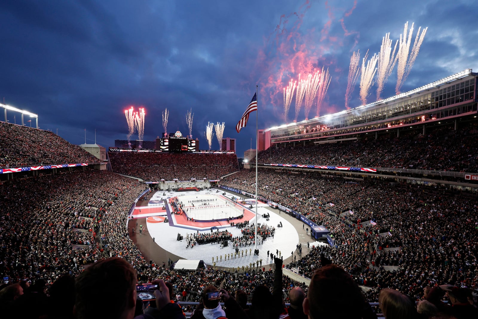 Fireworks are set off before the start of the Stadium Series NHL hockey game between the Detroit Red Wings and the Columbus Blue Jackets at Ohio Stadium, Saturday, March 1, 2025, in Columbus, Ohio. (AP Photo/Jay LaPrete)