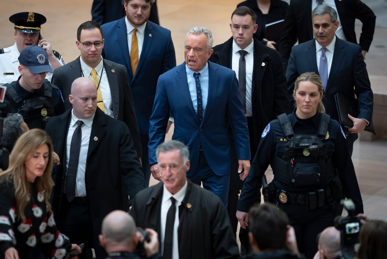 Robert F. Kennedy Jr., President-elect Donald Trump's nominee to be Secretary of Health and Human Services, arrives at the Hart Building to meet with Senators at the Capitol in Washington, Monday, Dec. 16, 2024. (AP Photo/J. Scott Applewhite)