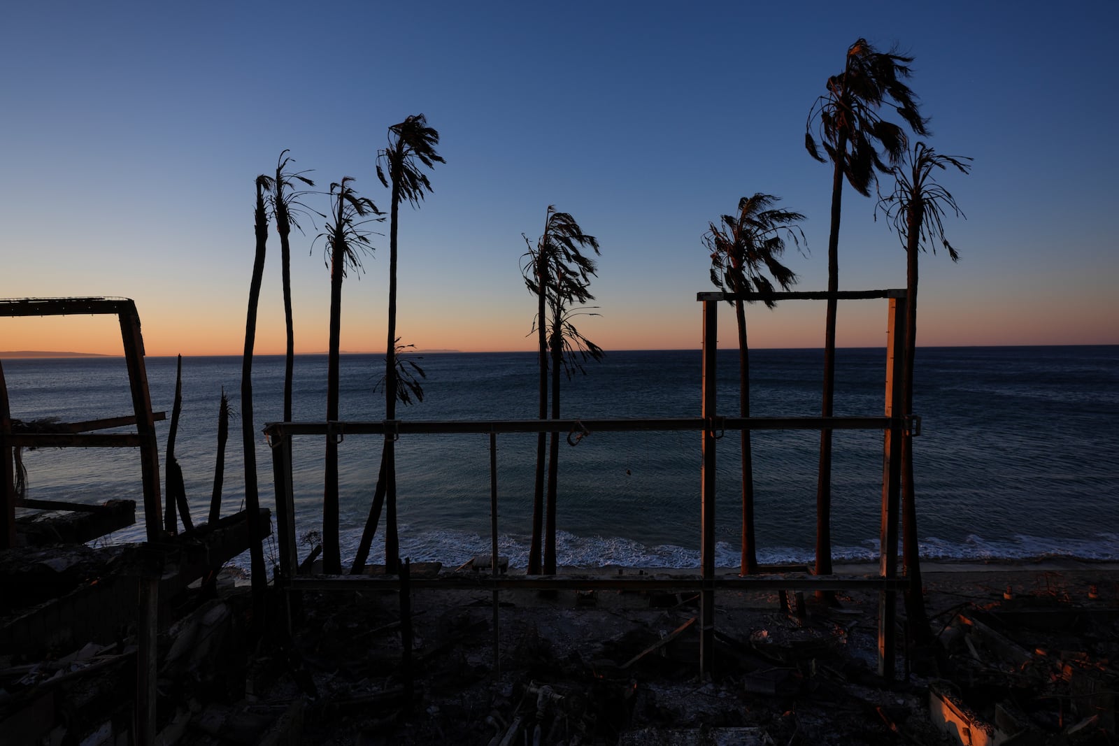 A beach front home destroyed by the Palisades Fire is seen in Malibu, Calif., Wednesday, Jan. 15, 2025. (AP Photo/Jae C. Hong)