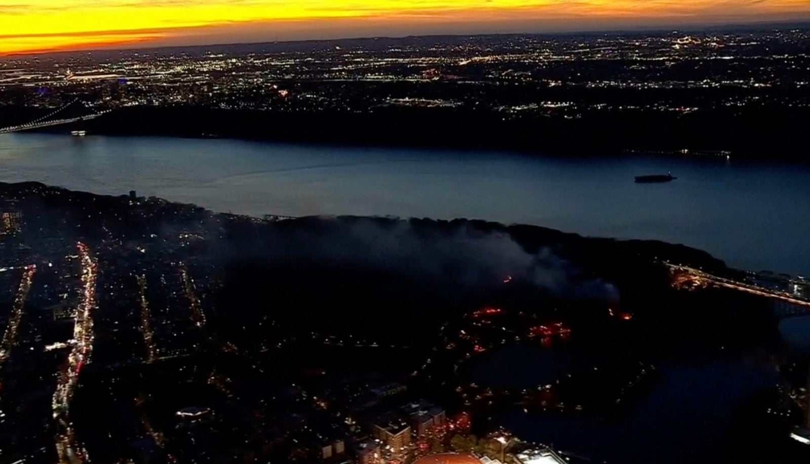 This aerial image taken from video shows a brush fire that broke out in a park on the northern tip of Manhattan in Inwood, N.Y., Wednesday, Nov. 13, 2024. (WABC-TV via AP)