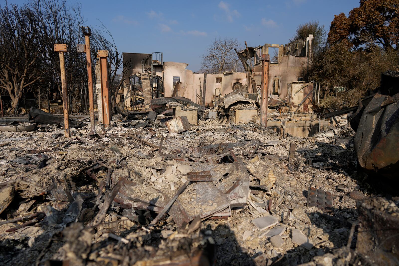 What remains of Chef Daniel Shemtob's home destroyed by the Palisades Fire is seen, Sunday, Jan. 19, 2025, in the Pacific Palisades neighborhood of Los Angeles, Calif. (AP Photo/Carolyn Kaster)