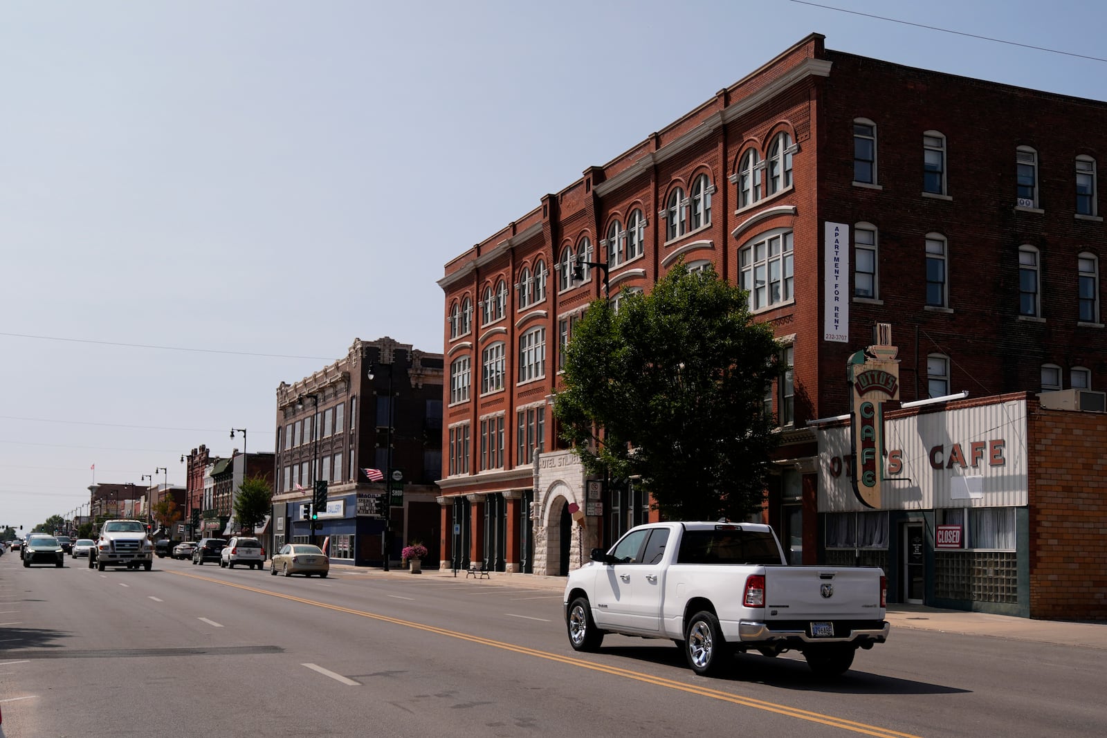 FILE - People drive through downtown Pittsburg, Kan., Tuesday, Sept. 10, 2024, that is home to a new Planned Parenthood clinic serving patients from Kansas as well as nearby Missouri, Oklahoma, Arkansas, Texas, and other states where abortions have become illegal or hard to get. (AP Photo/Charlie Riedel, File)