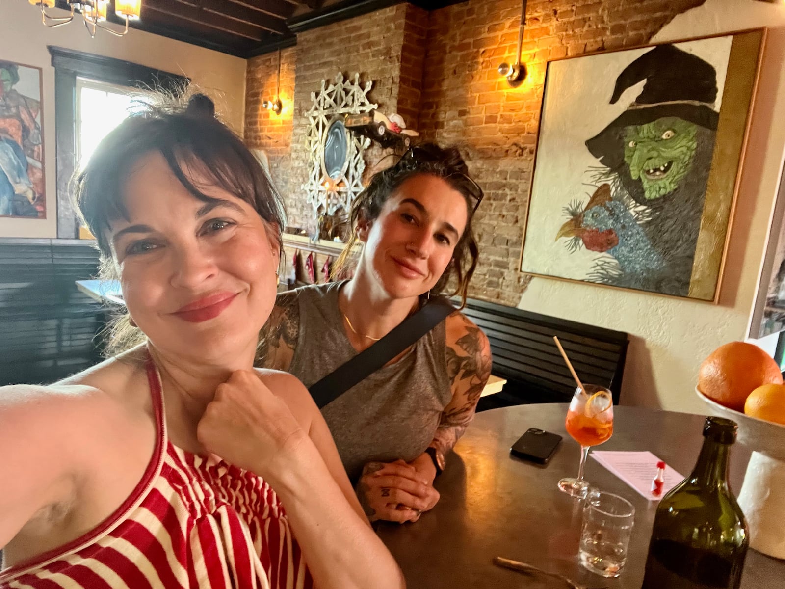 Artists Mychaelyn Michalec (left) and Danielle Rante (right) at the Silver Slipper Wine Bar in Dayton, Ohio.