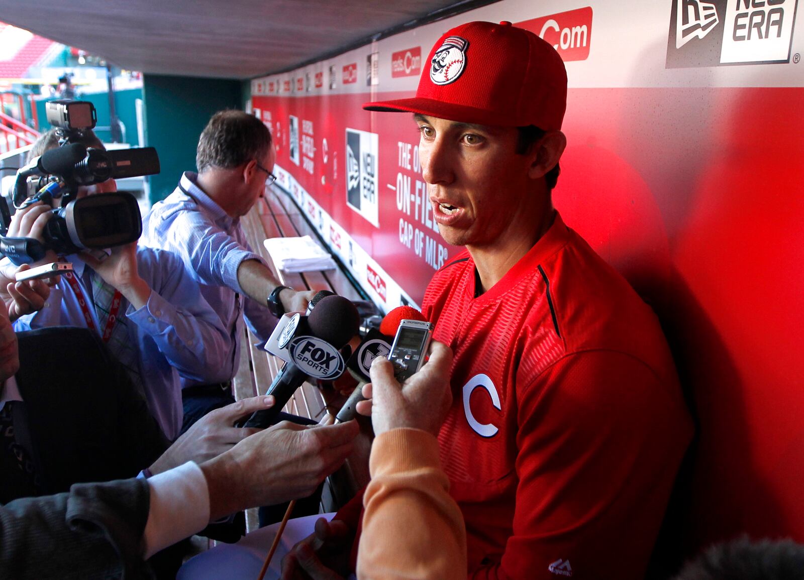 Pitcher Michael Lorenzen speaks to reporters in the Reds dugout on Tuesday, April 28, 2015, at Great American Ball Park in Cincinnati. David Jablonski/Staff