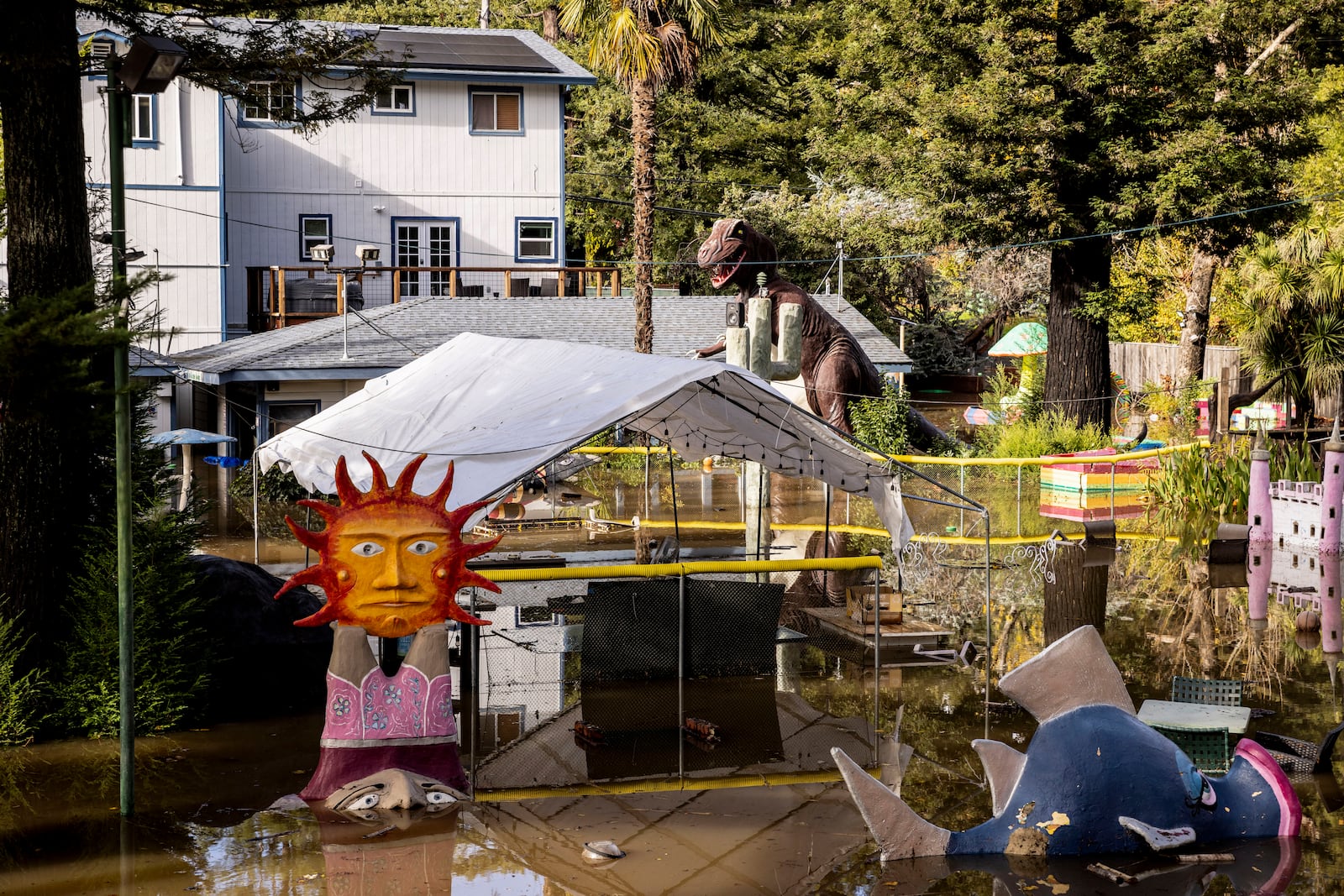 Floodwater surrounds Pee Wee Golf & Arcade after a major storm in Guerneville, Calif., Saturday, Nov. 23, 2024. (Stephen Lam/San Francisco Chronicle via AP)