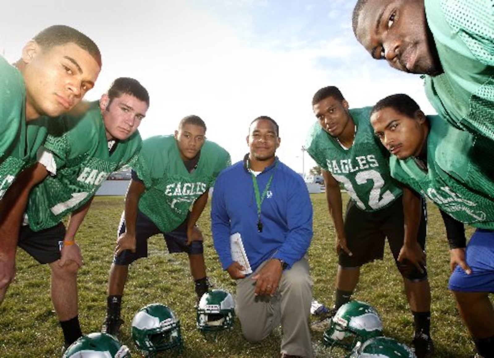 Chaminade Julienne football players (left to right) Darian Reynolds, Sam Spees, Marco Gresham, head coach Marcus Colvin, Brandon Payne, Christopher Darden and Darrien Howard, October, 2011. TEESHA MCCLAM / STAFF