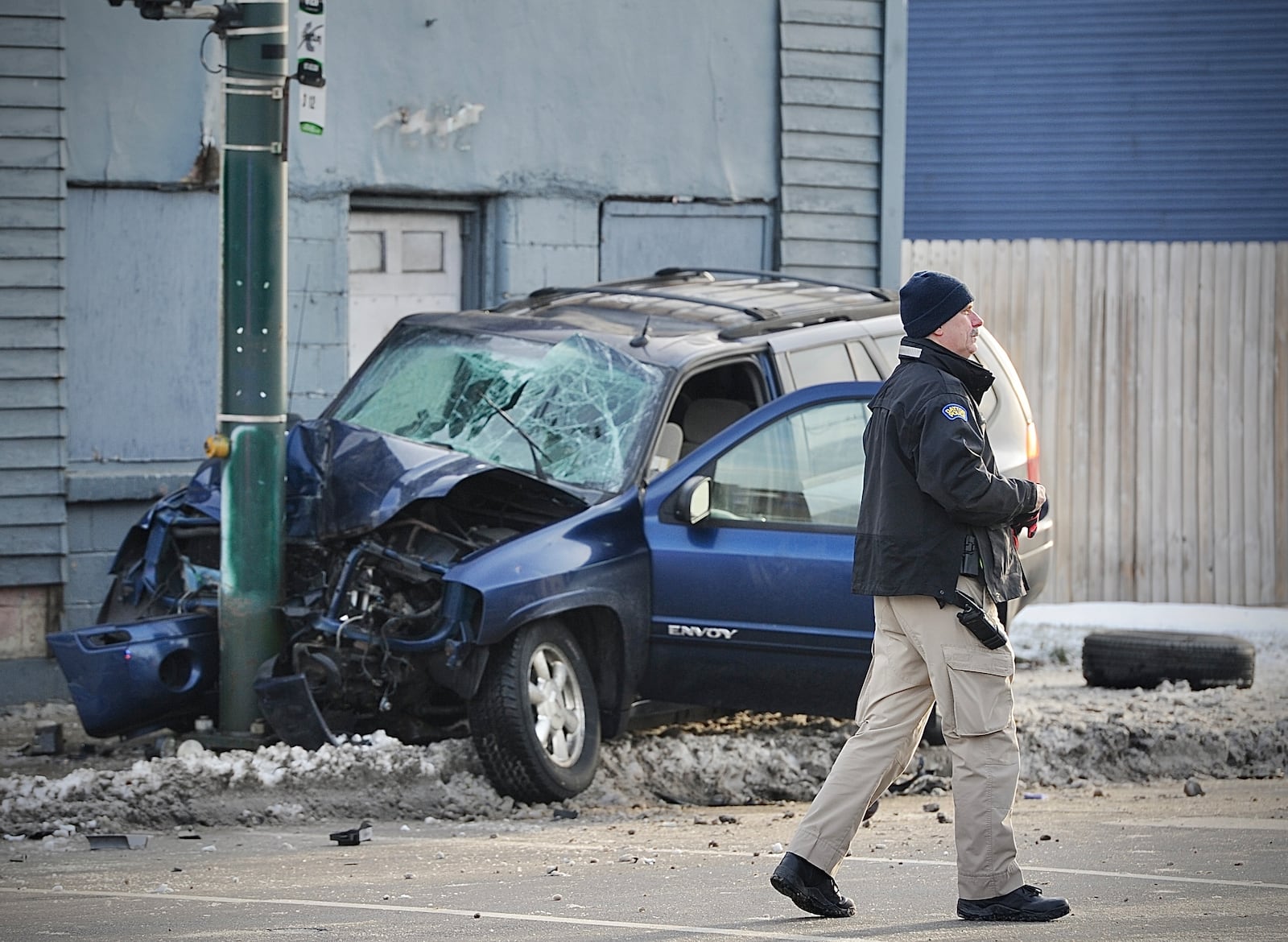 A pedestrian identified as 44-year-old Jennifer Johnson of Dayton was killed and the driver of a GMC Envoy, Jerry Logsdon of Dayton, was seriously injured in a crash Wednesday morning, Dec. 28, 2022, on Wayne Avenue in Dayton. MARSHALL GORBY\STAFF