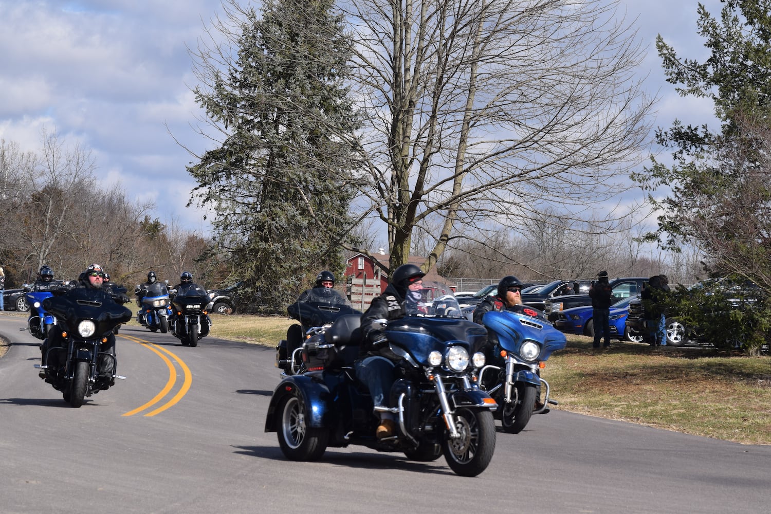 PHOTOS: Thousands of Outlaws attend motorcycle gang leaders funeral at Montgomery County Fairgrounds.