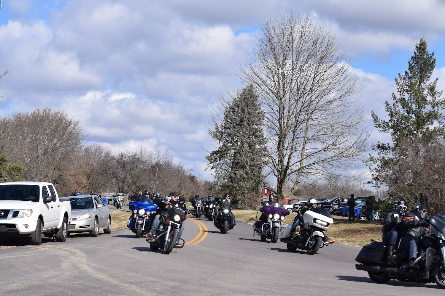 PHOTOS: Thousands of Outlaws attend motorcycle gang leaders funeral at Montgomery County Fairgrounds.