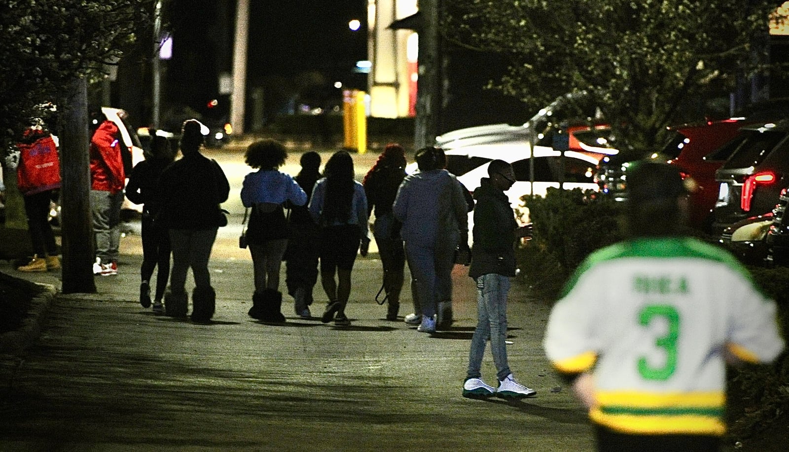 University of Dayton and Dayton Police keep a close eye on crowds of students Saturday night, March 16, 2024. MARSHALL GORBY \STAFF