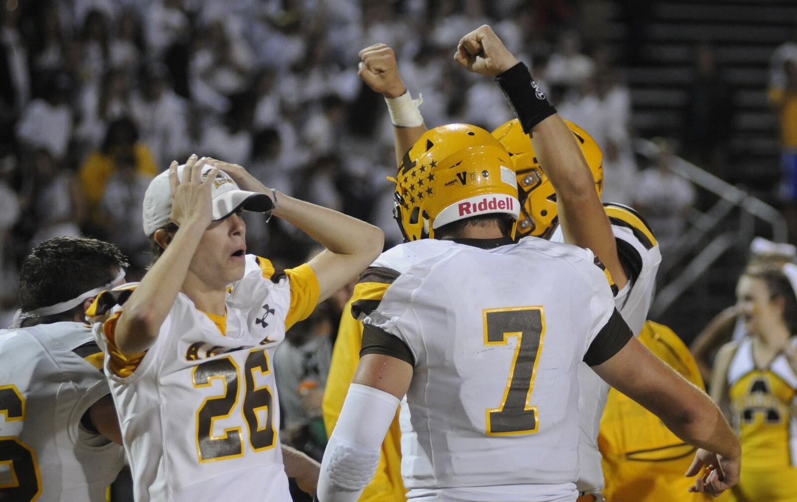 Alter’s John Taylor (26) and Conner Bazelak (7) celebrate. Alter defeated host Centerville 10-7 in a Week 3 high school football game on Friday, Sept. 7, 2018. MARC PENDLETON / STAFF