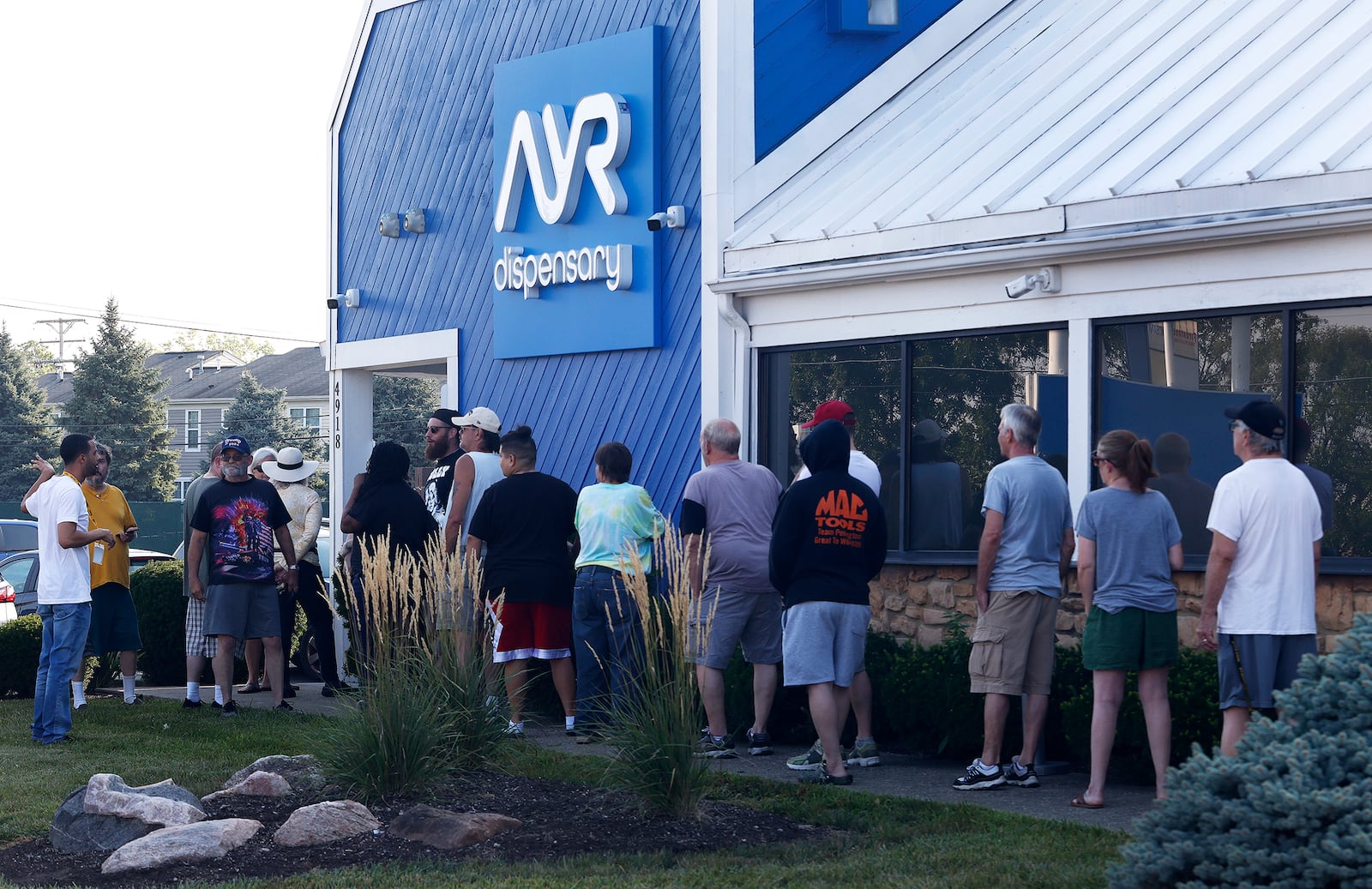 People lined up outside the ARY Dispensary, located at 4918 Airway Rd. Tuesday, Aug. 6, 2024 for the opening of recreational sales of marijuana. MARSHALL GORBY\STAFF