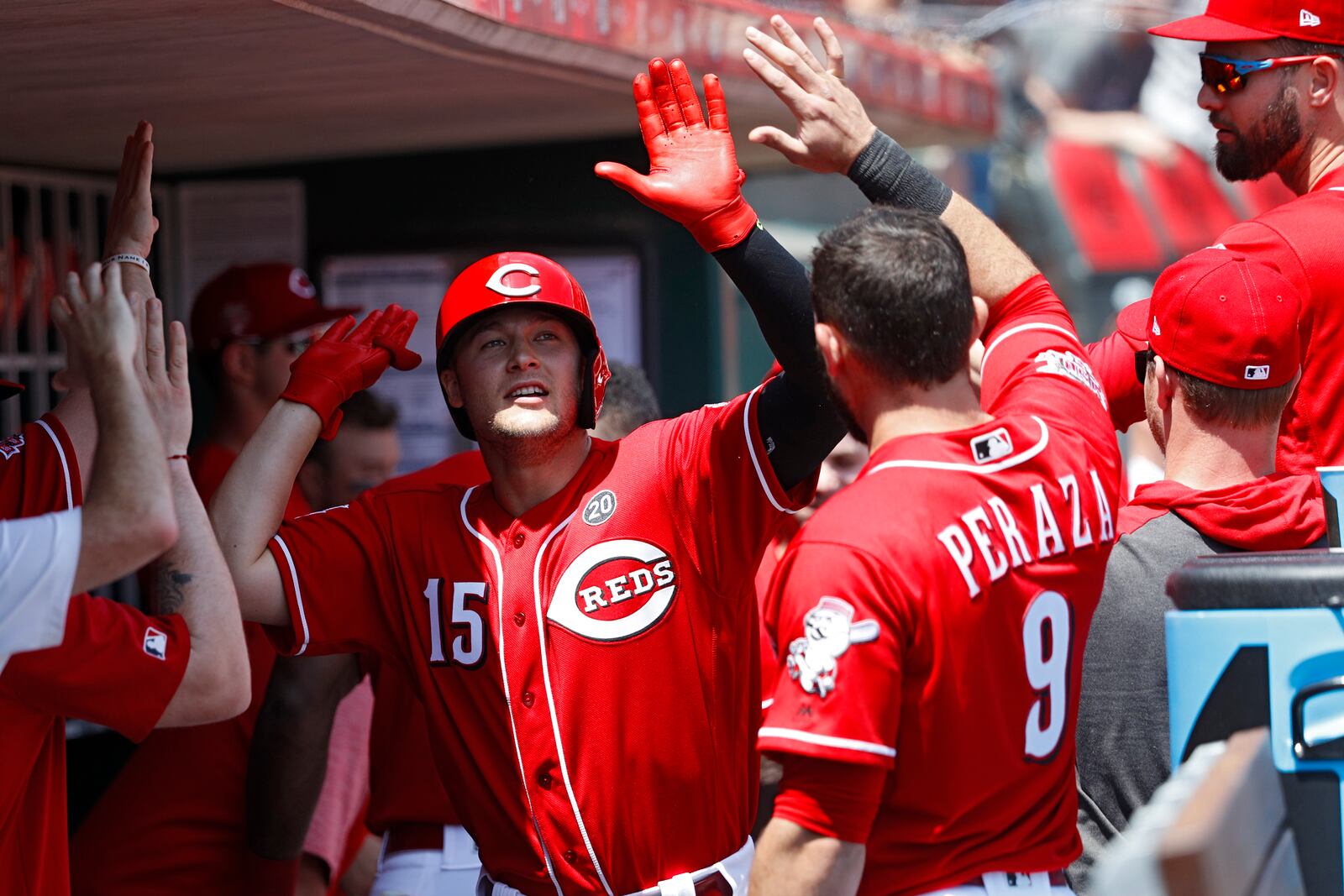 CINCINNATI, OH - MAY 06: Nick Senzel #15 of the Cincinnati Reds is congratulated in the dugout after hitting his second home run of the game in the second inning against the San Francisco Giants at Great American Ball Park on May 6, 2019 in Cincinnati, Ohio. (Photo by Joe Robbins/Getty Images)