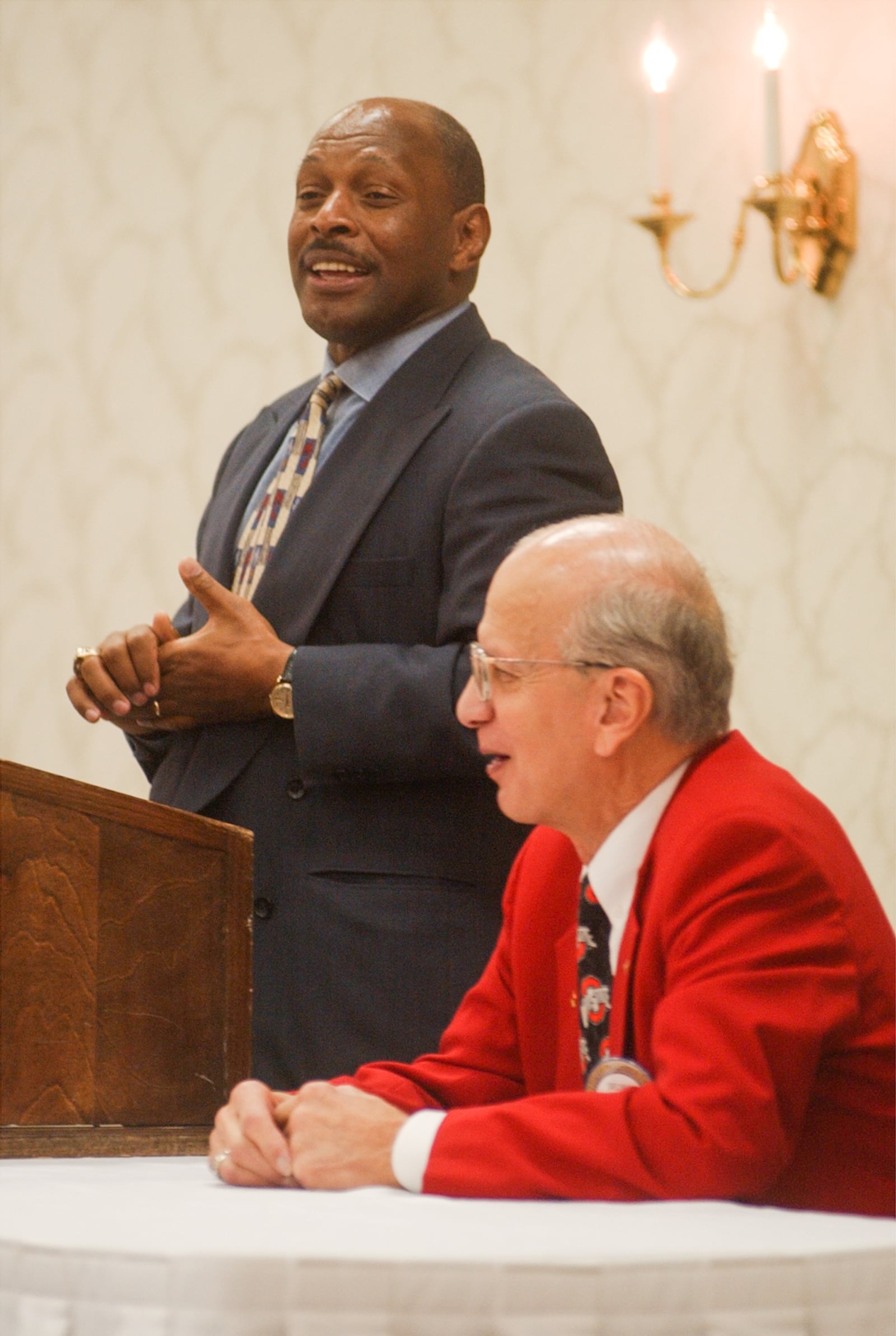 GREG LYNCH/JOURNALNEWS
Ohio State Alum and Hamilton Rotarian George Jonson listens to the only two time Heisman trophy winner Archie Griffin who spoke at the Rotary meeting, Thursday.  Griffin is now the associate athletic director at the university.