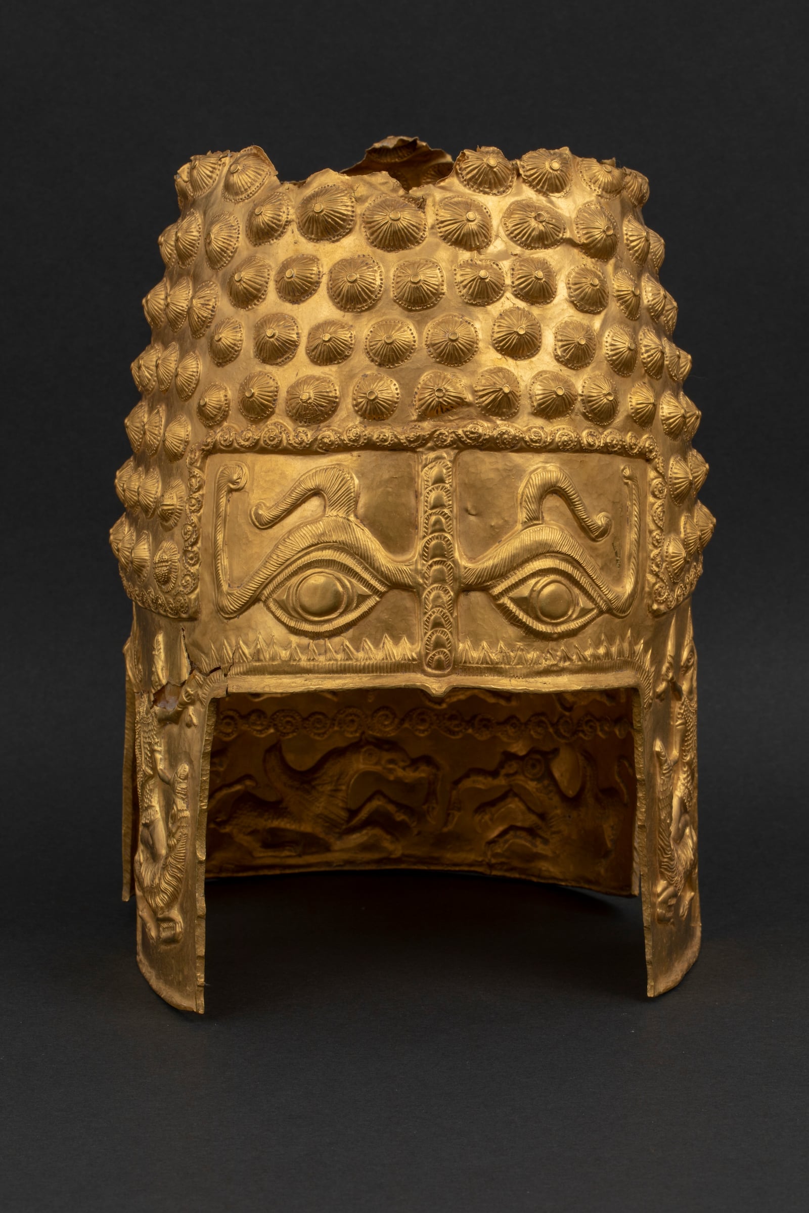 This undated image provided by the Drents Museum shows the golden Cotofenesti helmet. (Drents Museum via AP)