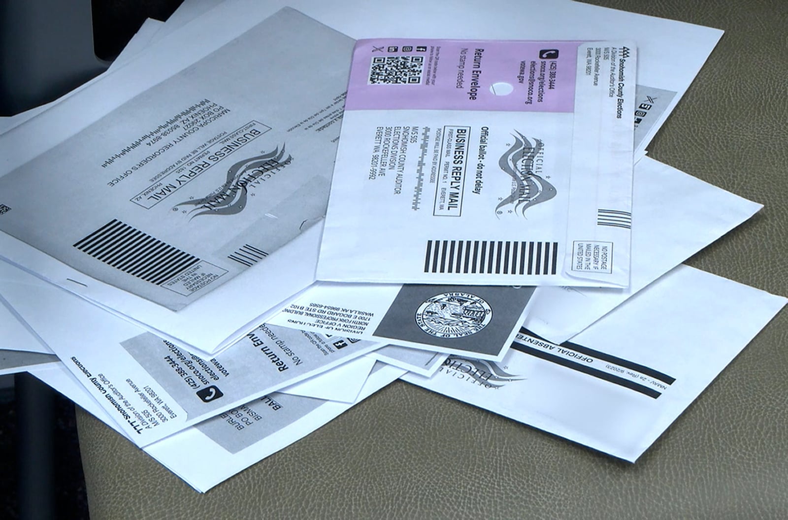 Out-of-state ballots that the U.S. Postal Service delivered to the Cascade County elections office in Great Falls, Mont., are seen on Nov. 7, 2024 (Joee Taylor/NonStop Local)