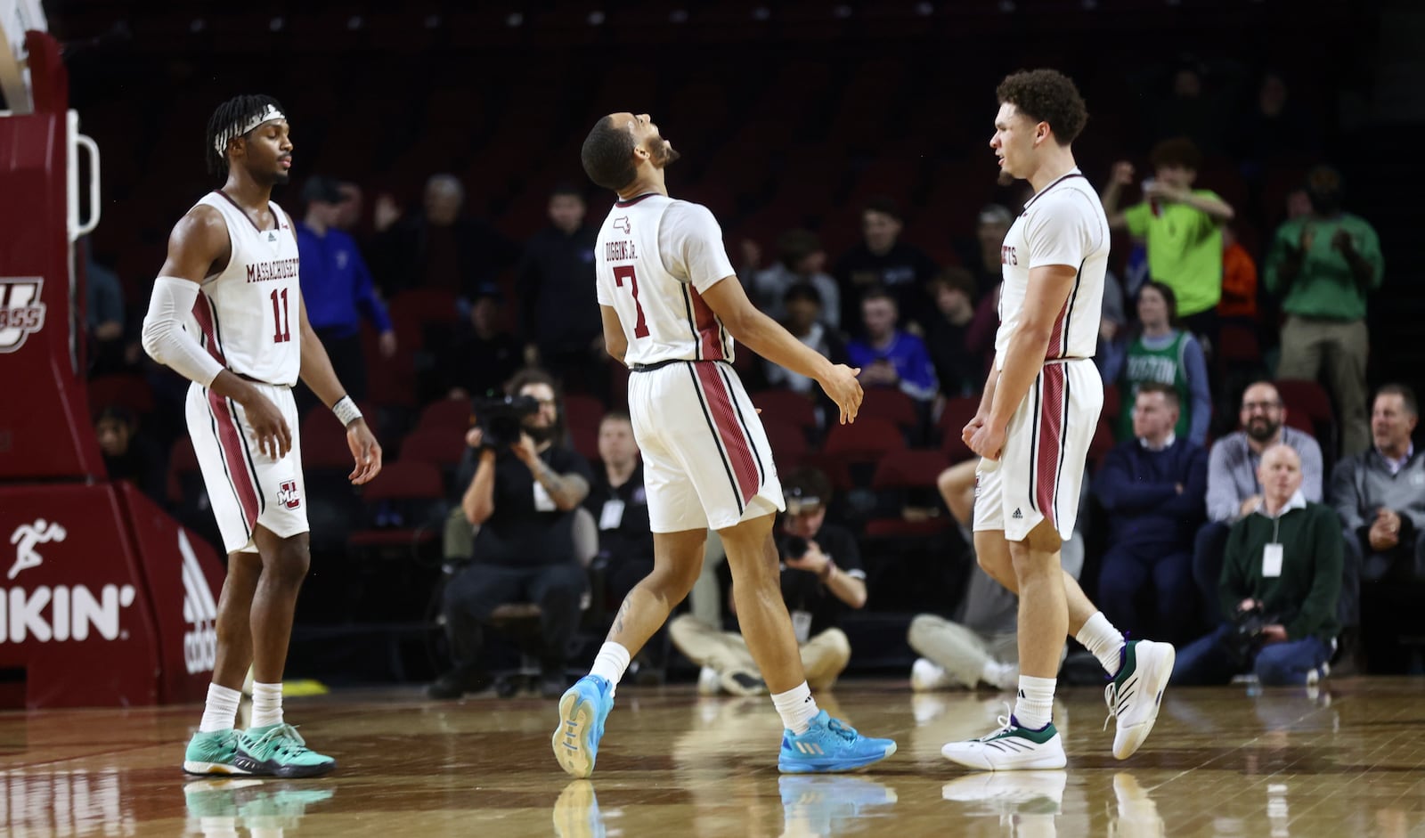 Massachusetts celebrates after a basket in the final minute against Dayton on Wednesday, Jan. 8, 2025, at the Mullins Center in Amherst, Mass. David Jablonski/Staff