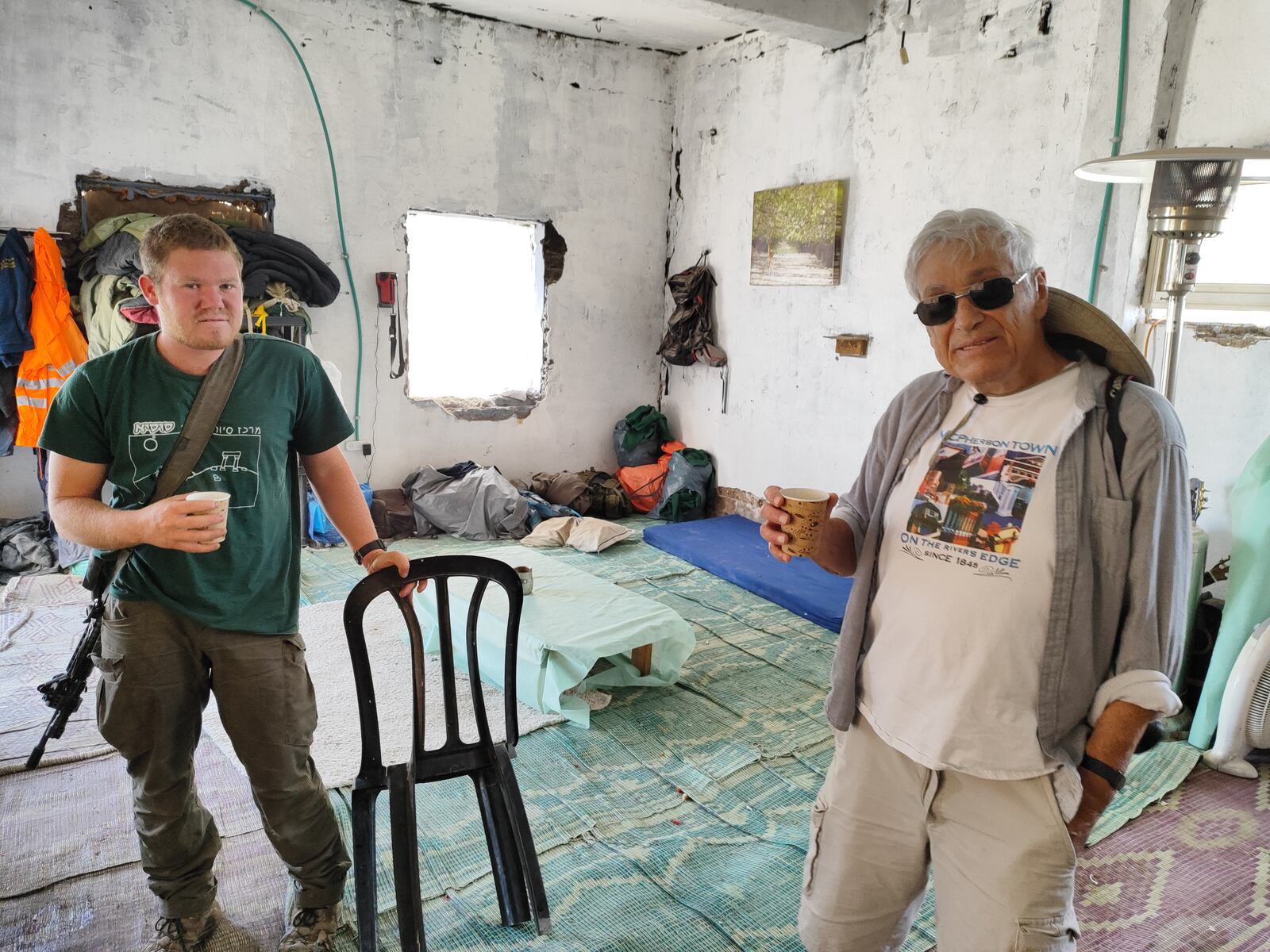 Jim Nathanson (right) with Yoav (left) at his makeshift home in the Judean Desert.   (Photo credit: Yoni Shtern)