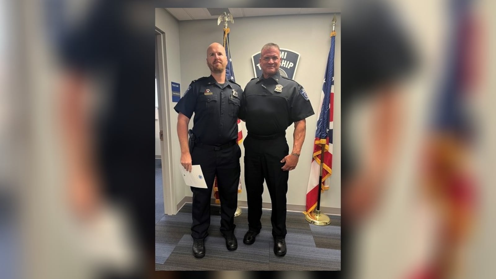 James McCarty (left) took to his new role as Miami Twp. Police Department's assistant chief  June 3, 2024, moving up from his former rank as administrative sergeant. Swearing him in was Miami Twp. Police Chief Charlie Stiegelmeyer (right). CONTRIBUTED