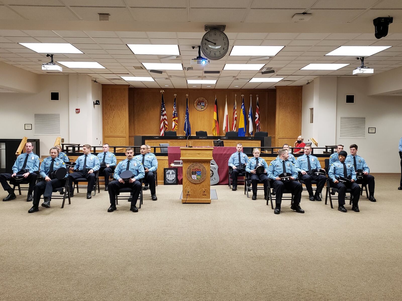 A photo posted to the Dayton Police Department's Twitter account, is captioned, "Getting ready to graduate! The 16 members of the 110th #DaytonPolice Recruit Class will be sworn in as officers this morning.  Congrats to all!"