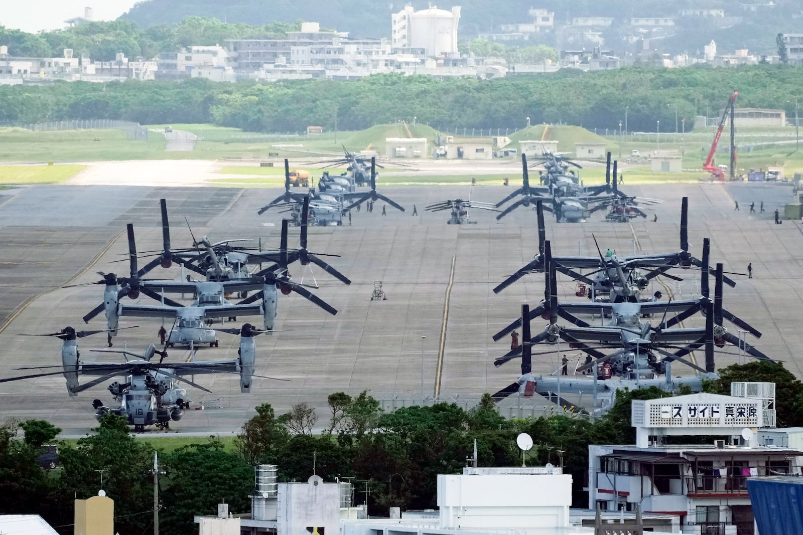 FILE - U.S. MV-22 Osprey transport aircraft are parked at the U.S. Marine Corps Air Station Futenma in Ginowan, south of Okinawa, southern Japan, Sept. 6, 2023. (AP Photo/Hiro Komae, File)