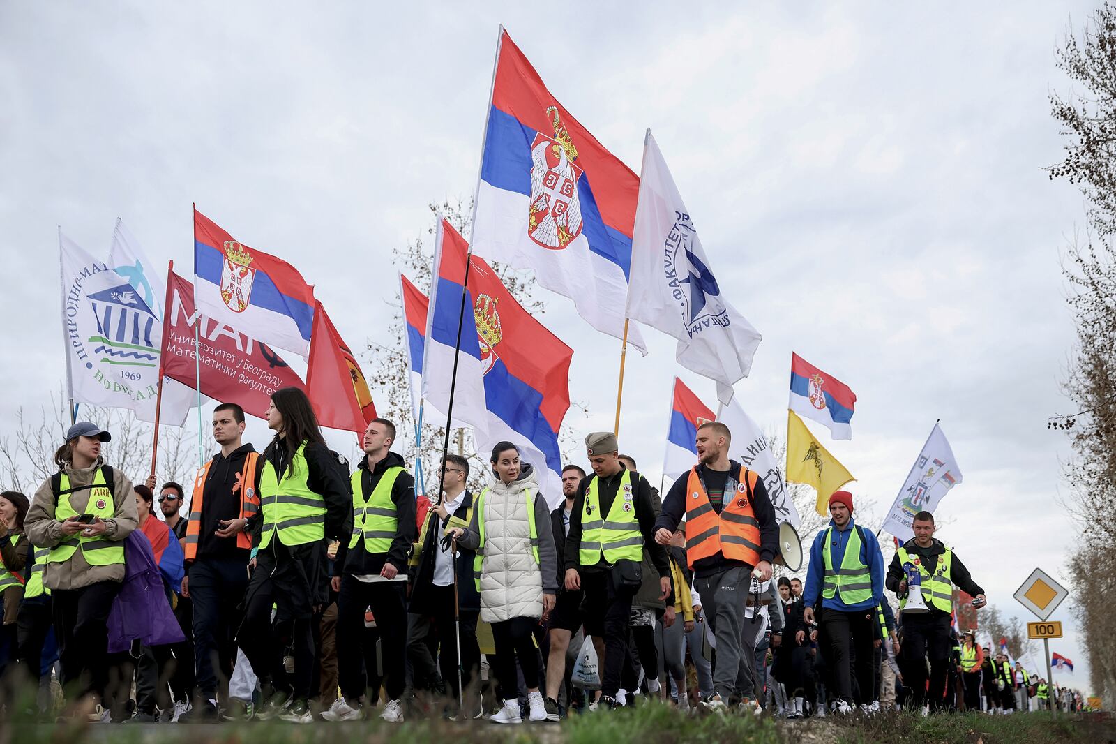 Students and anti-government protesters march to Belgrade for a joint protest after taking a break in Nova Pazova, Serbia, Friday, March 14, 2025. (AP Photo/Armin Durgut)