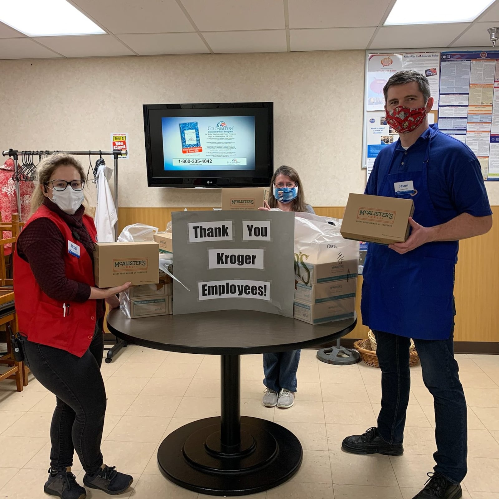 Kroger employees pose with their lunches purchased through a GoFundMe. CONTRIBUTED