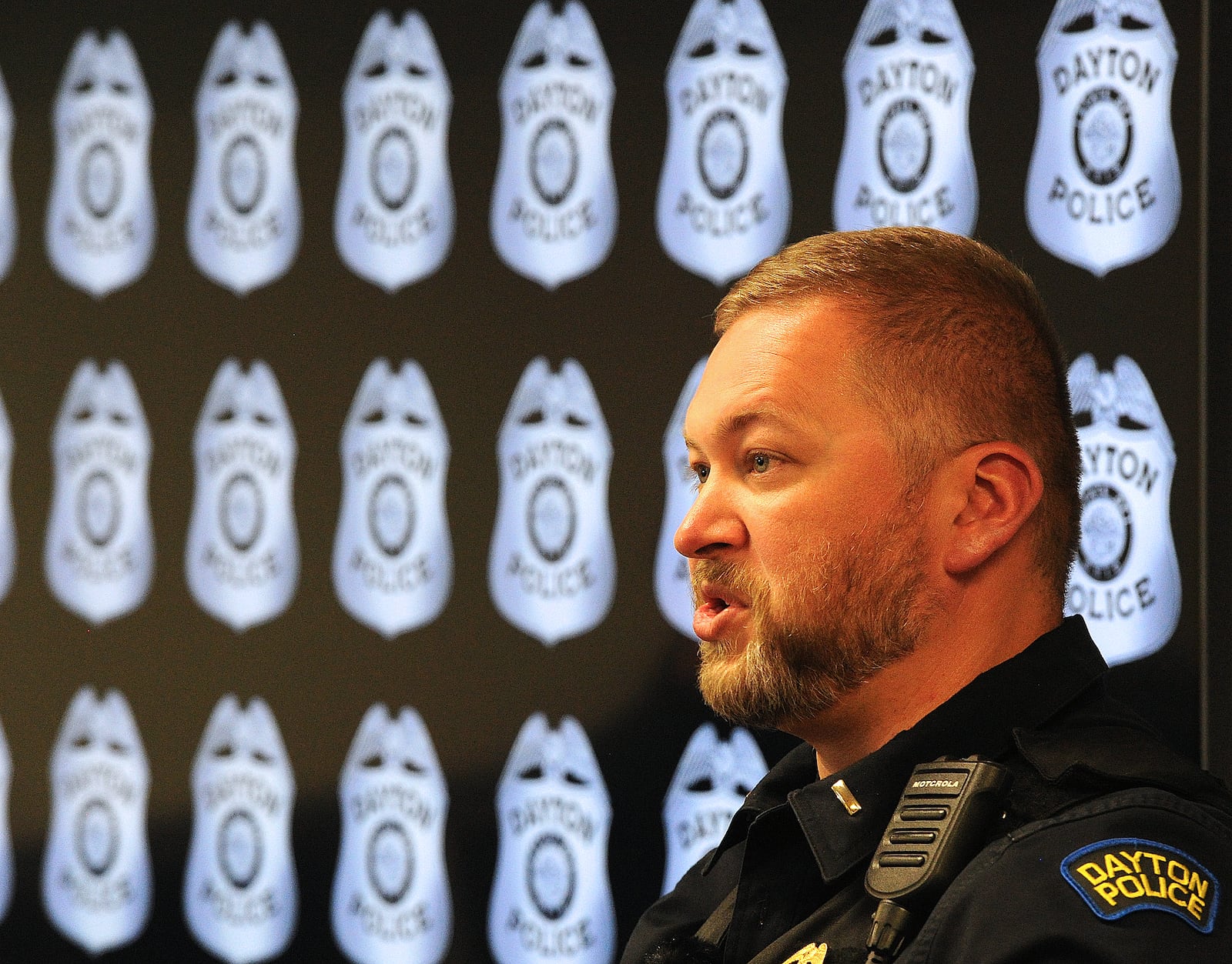 Dayton Police Lt. Randy Beane talks at a press conference Thursday, April 25, 2024 about 3 people being arrested, including 1 who hit Dayton officer. The arrest happen during auto theft suppression effort Wednesday night. MARSHALL GORBY\STAFF