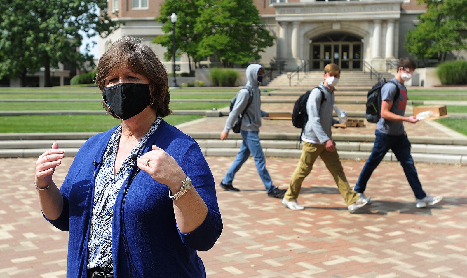 Carolyn Roecker Phelps, associate provost for faculty and administrative affairs at the University of Dayton, on Wednesday discuss with reporters the first day of in-person learning on campus. MARSHALL GORBY/STAFF