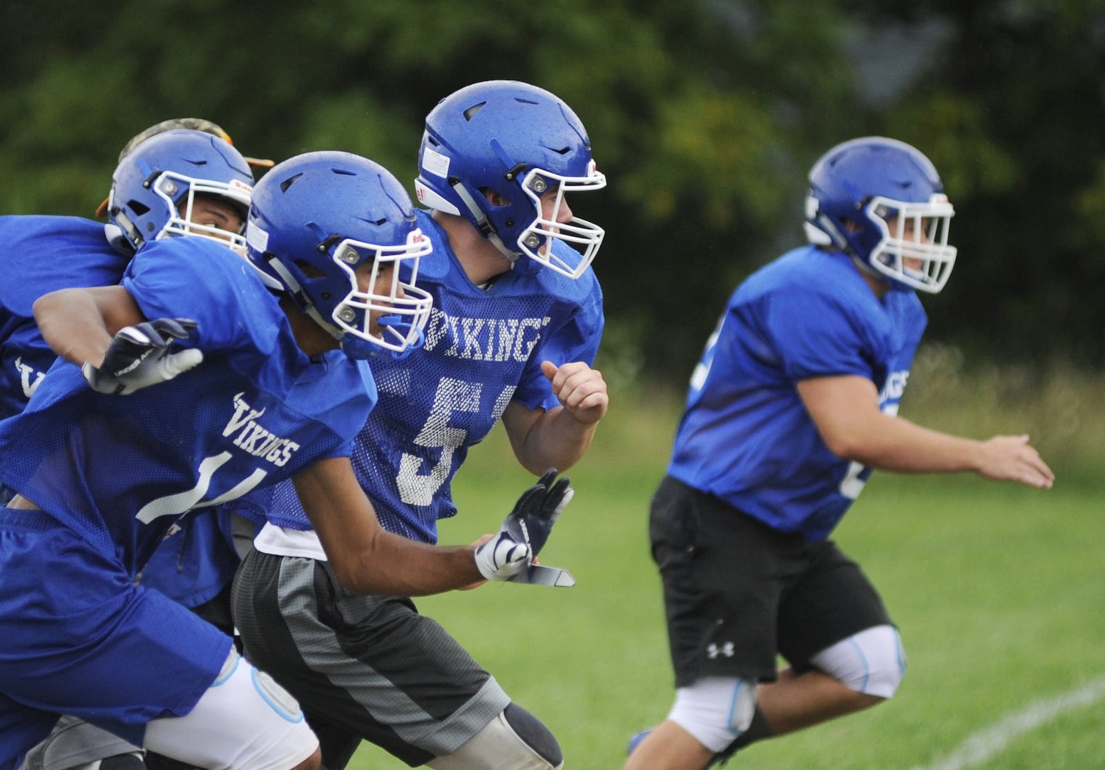 Miami East football players participate in a preseason practice on Wed., Aug. 15, 2018. MARC PENDLETON / STAFF