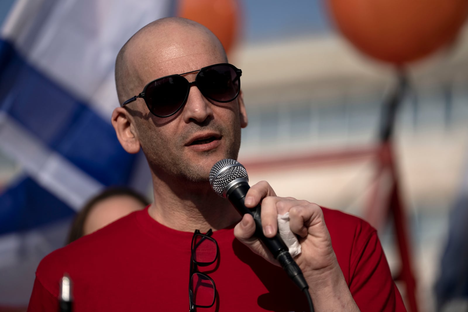 Freed hostage Iair Horn speaks to journalists in Tel Aviv, Israel, in his first public appearance since he was released from captivity in the Gaza Strip, Wednesday, Feb. 26, 2025. (AP Photo/Maya Alleruzzo)