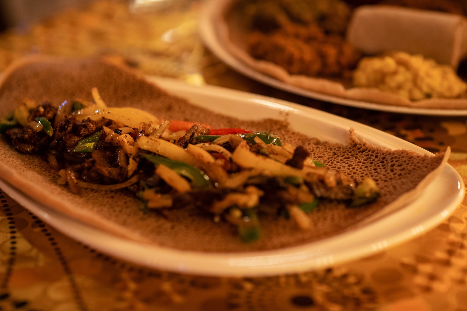 Nanyea Restaurant and Coffee House features dishes that are accompanied by injera; a spongy fermented flatbread that can be piled with hearty stews, vegetables, and a variety of different meats. The food is bright, spicy, and full of flavor. CONTRIBUTED