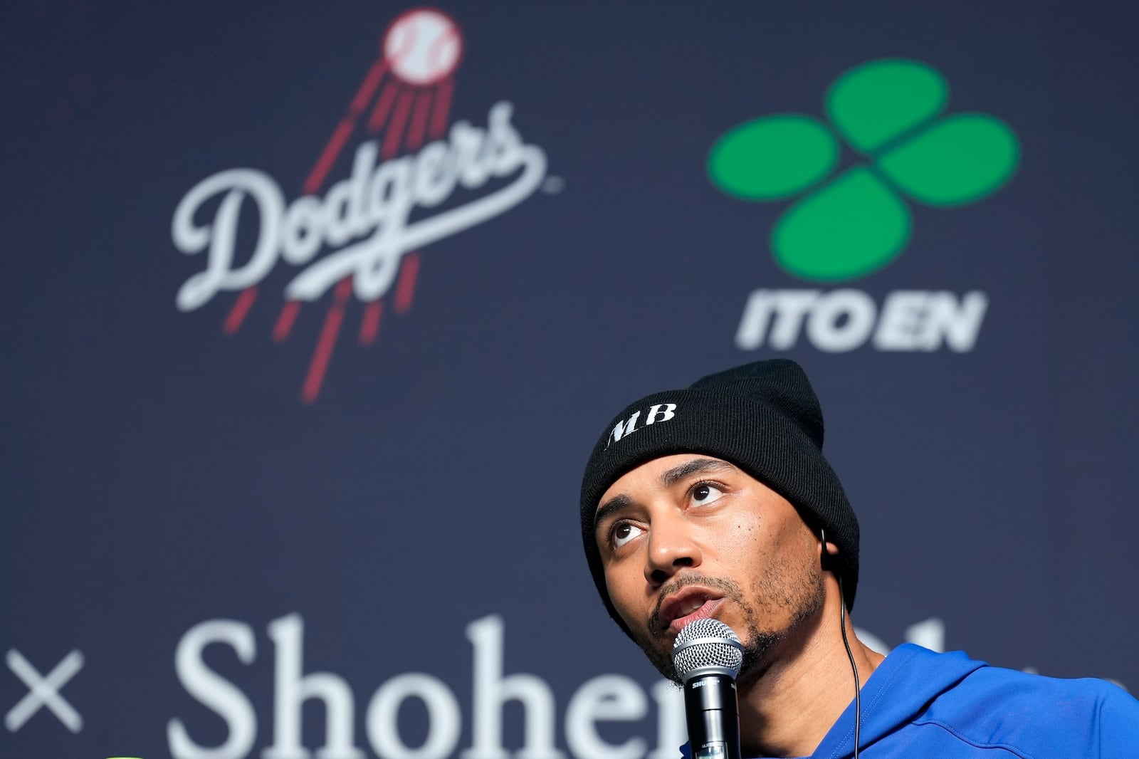 Los Angeles Dodgers right fielder Mookie Betts speaks during a sponsor's promotional event in Tokyo, Tuesday, Jan. 21, 2025. (AP Photo/Eugene Hoshiko)